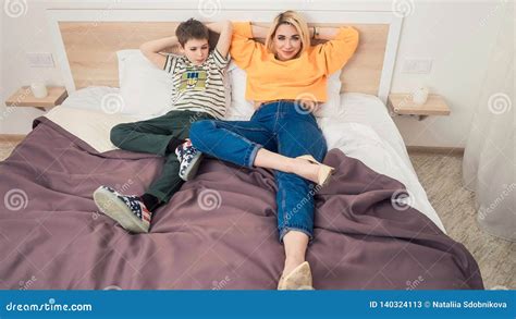 Mom and Son Accidental Erection. . Step mom and son share bed